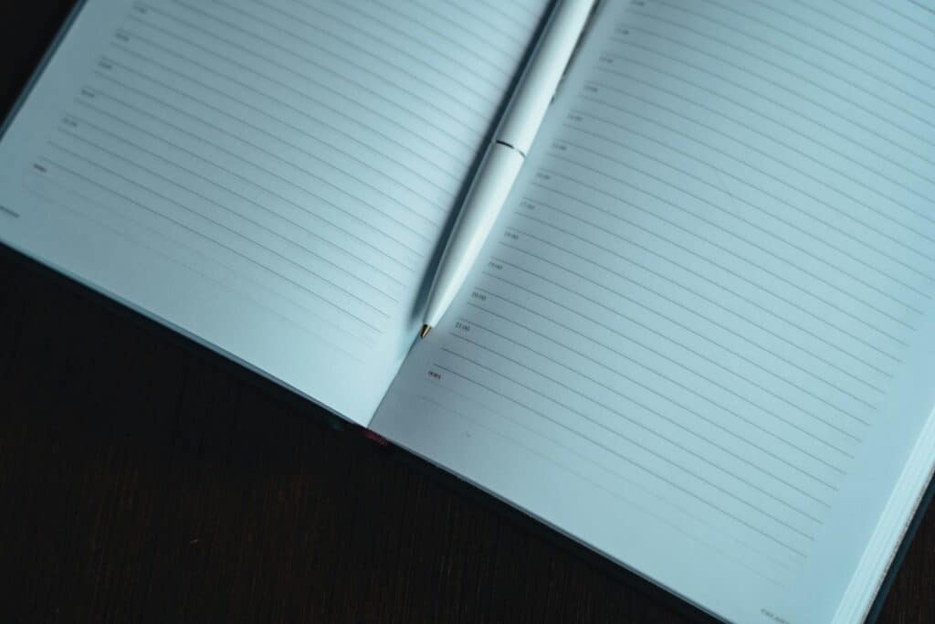 7 Daily Habits That Boost Mental Clarity and Focus 3 Open journal and pen for daily journaling habit