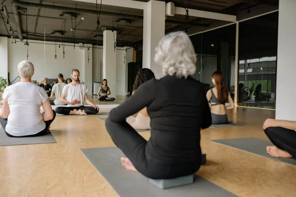 Title: 5 Natural Ways to Reduce Stress and Anxiety 2 people practicing deep meditation