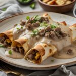 Southern Breakfast Enchiladas with Sausage Gravy
