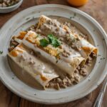 Southern Breakfast Enchiladas with Sausage Gravy